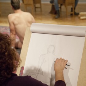 Woman drawing man