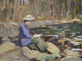 A painting of Arthur Lismer's wife, who sits on a stone along the shore of a lake. The painting is imprecise, created from large marks of colour. The wife wears a purple shirt, yellow hat with a purple ribbon and holds a book. The water around her is dark green with light blue flecks.