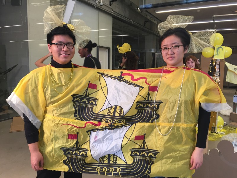 two youth wearing a hand-made sailship costume