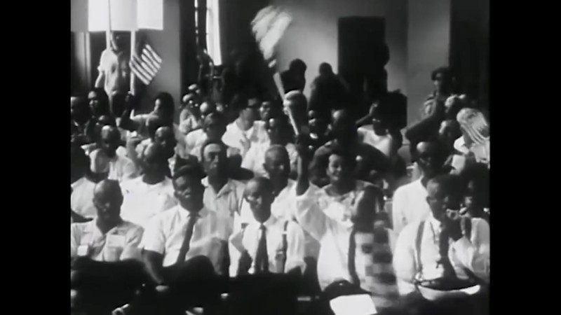 Film still of crowd from Arthur Jafa's Love is The Message, The Message is Death