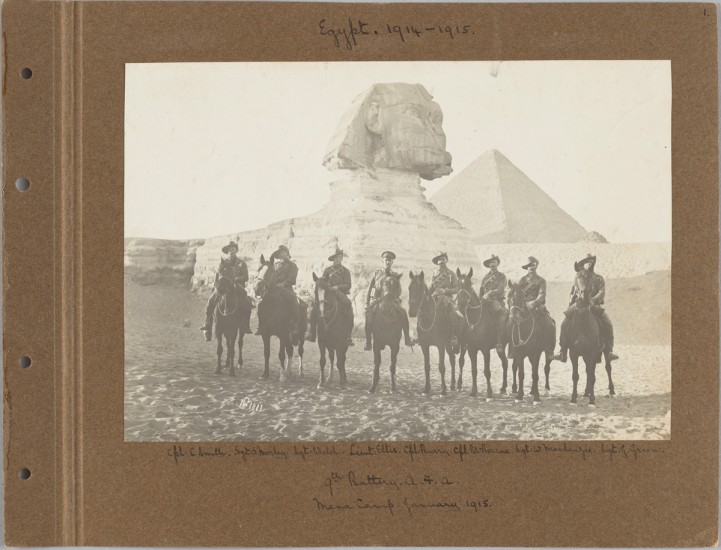 soliders on horses in front of the sphinx