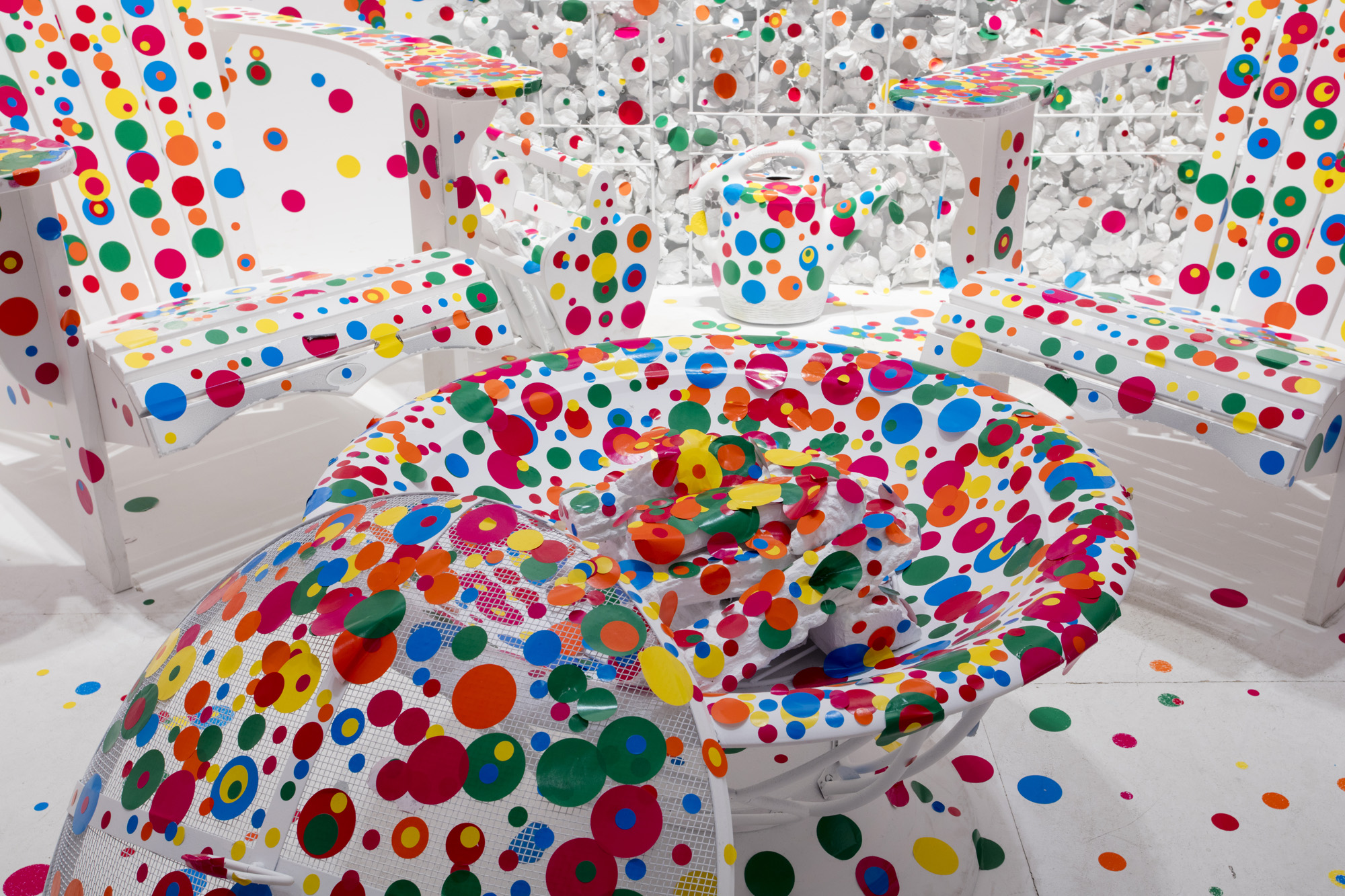 The AGO's The Obliteration Room covered with colourful dot stickers