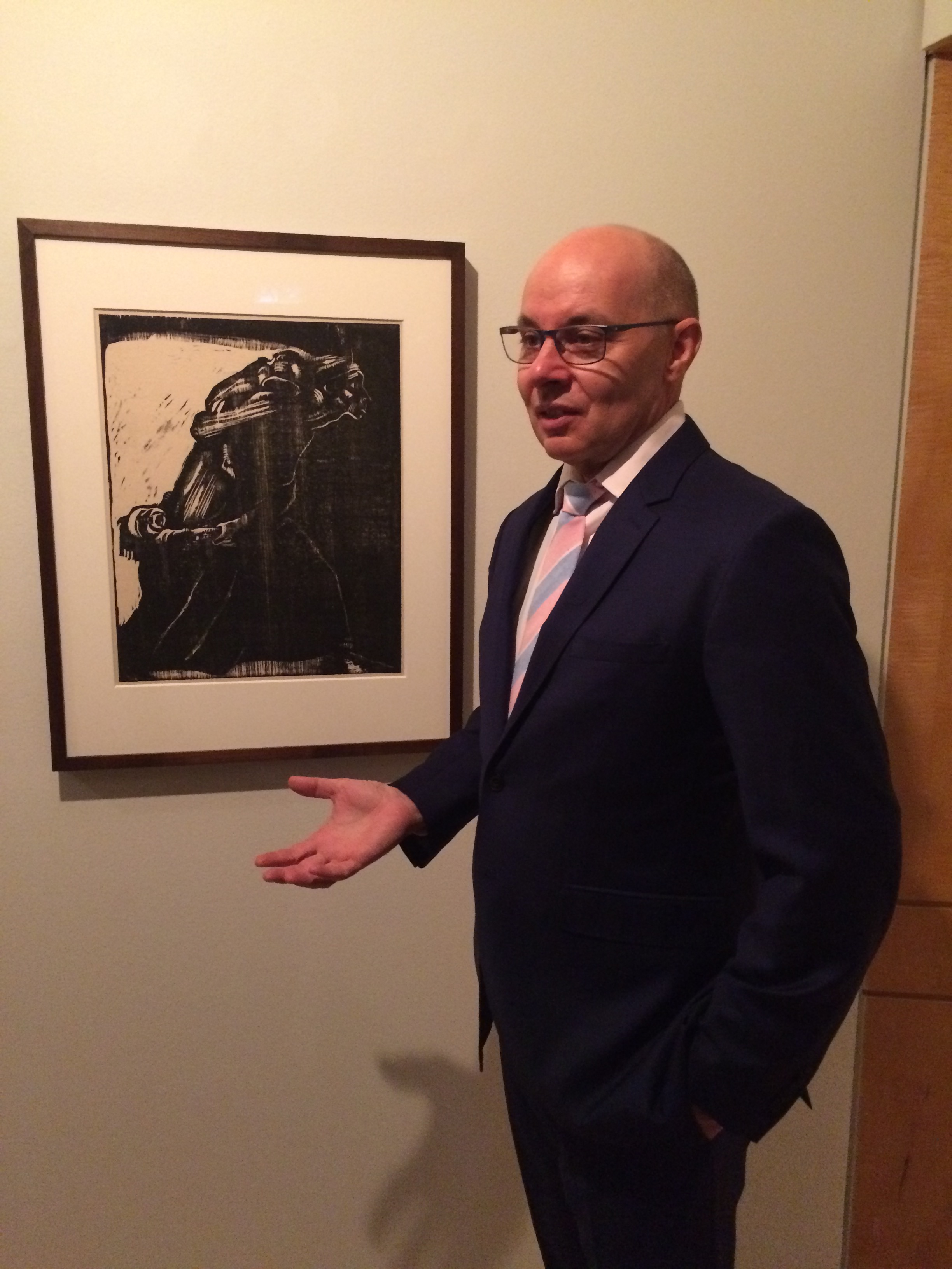 Dr. Brian McCrindle with Kathe Kollwitz work "Woman with Children Going to Their Death."