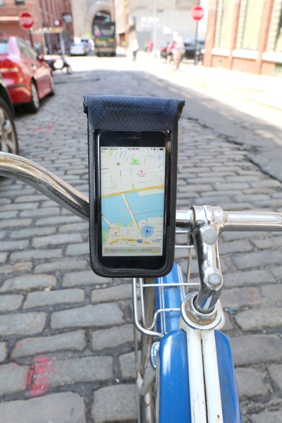 an iphone mounted on a bike