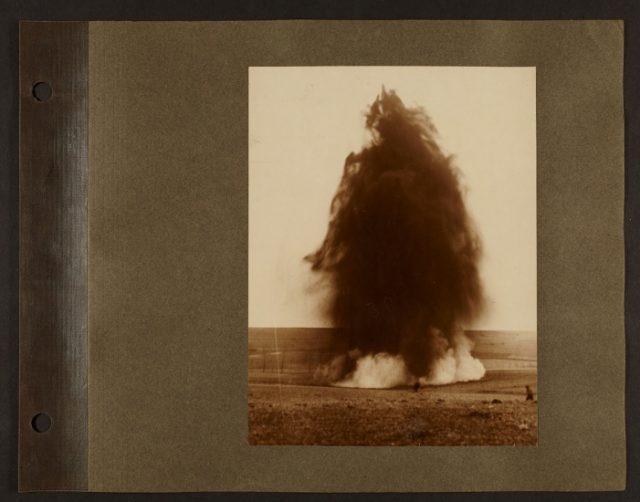 A photo of an explosion in a field