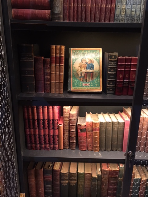 A collection of old books in a shelf