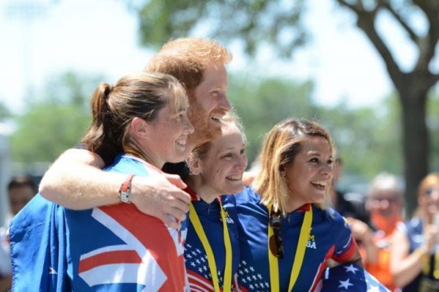 Prince Harry in photo opp with three girls