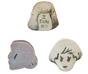 Three ceramic heads