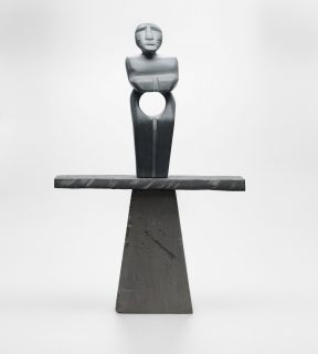 A statue of a man on a pedestal