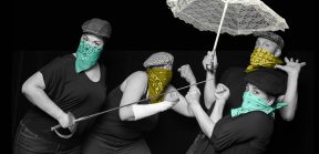 Four women with bandana's on their faces