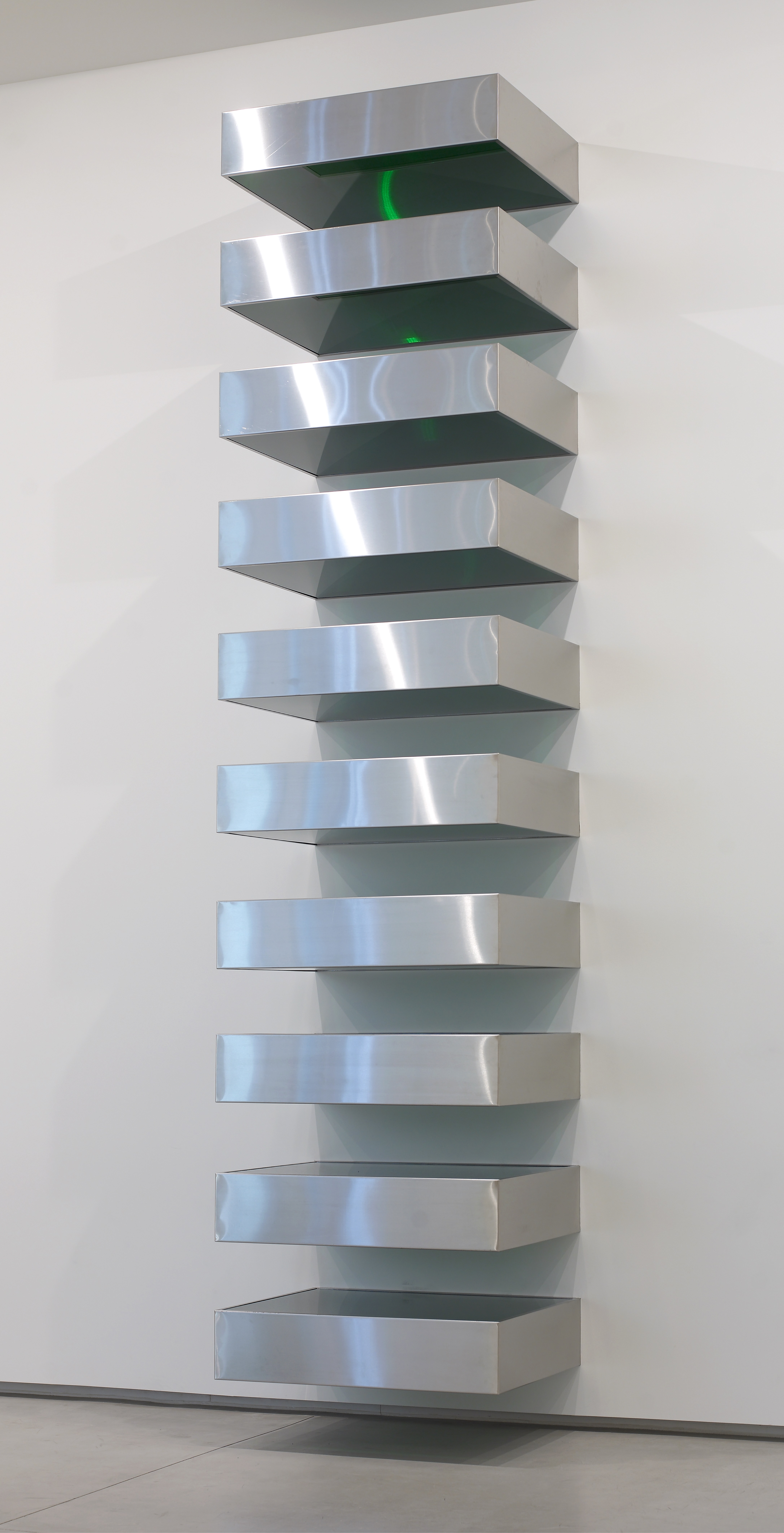 installation shot of Donald Judd silver boxes 