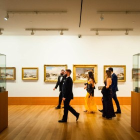 people on a tour of the gallery