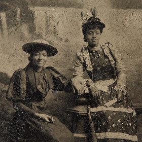 Tintype, 1880-1900. Unidentified women, Niagara Falls backdrop