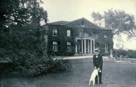 Mr. Smith standing outside of the Grange House