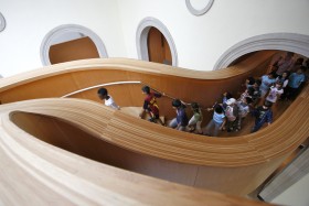 School tour on sculptural staircase