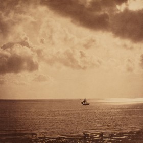 an old photograph of a ship on the water