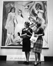 two women infron of picasso painting