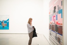 woman looking at art