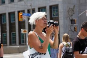 woman taking photo