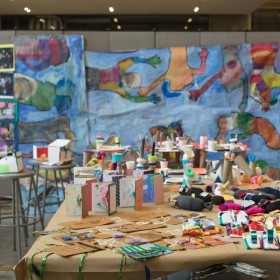 table of paints and paper crafts
