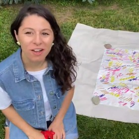 Amanda Arcuri is leading an art-making activity with camouflage