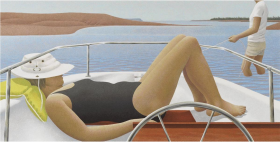 A woman wearing a bathing suit lays on the deck of a boat. There is a white hat over her face. A man is standing in the water behind her, fishing. 