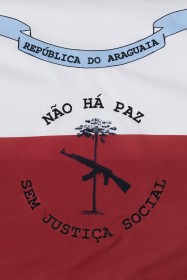 Utopia Island flag, a flag half in red and half in white with a pale blue banner and a assault rilfe in front of a tree with "no peace without social justice" written in Portuguese