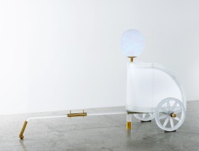 White chariot with white spherical bulb and long arm extending forward