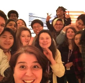 A selfie taken by Sarah Febbraro and a crowd of youth behind her