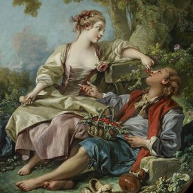 women feeding man cherries