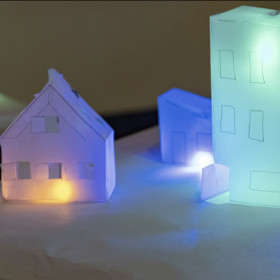 Glowing papercraft houses