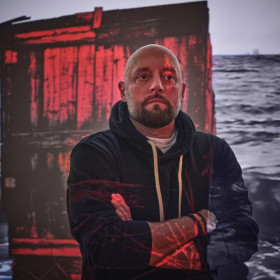 Artist Jerry Ropson with his work, Still.Drift.Return