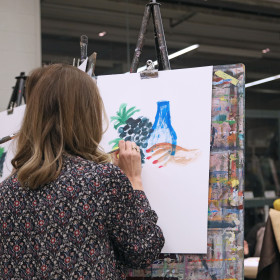 Artmaking by a student drawing a still life in an expressive manner