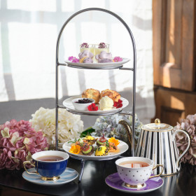 afternoon tea tour with flowers on the table