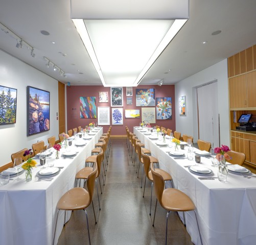 two long tables set for meal in Bistro Red Room