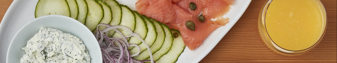 bagels, lox, cream cheese, cucumber, orange juice