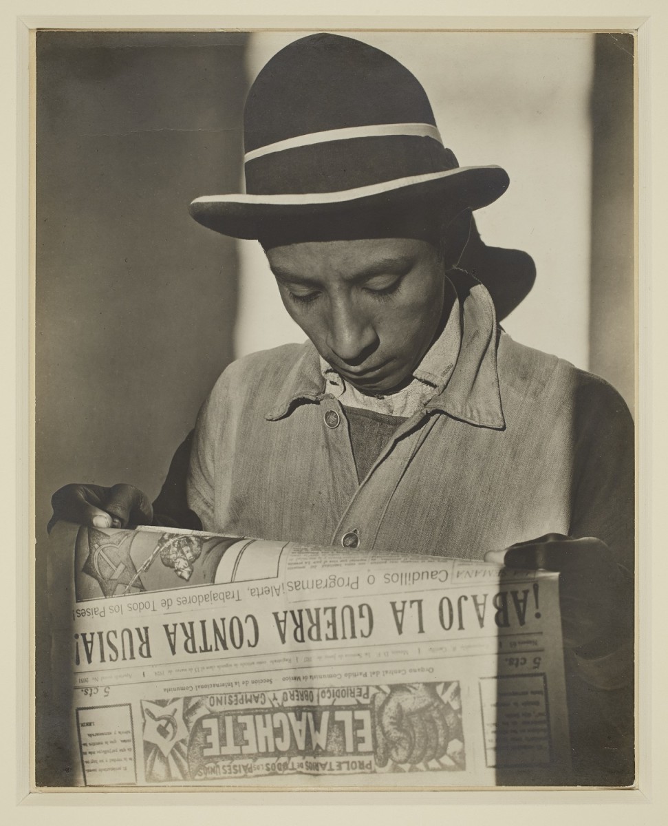 Tina Modotti Photograph. Man looks at newspaper