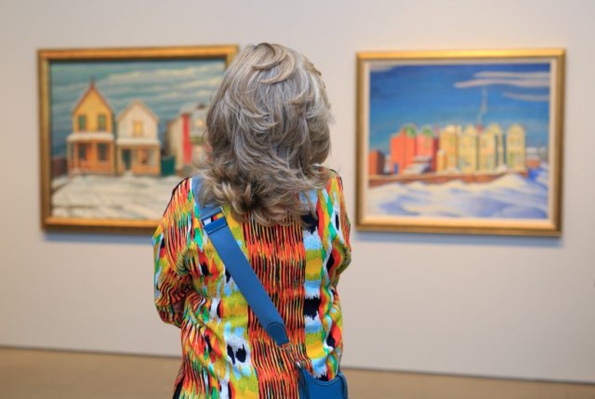 A women looking at art