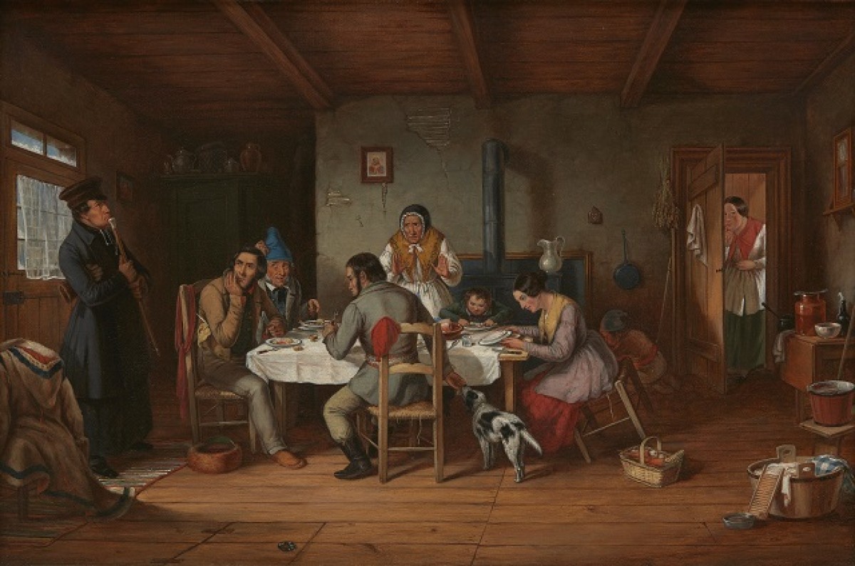 Family sitting around dinner table