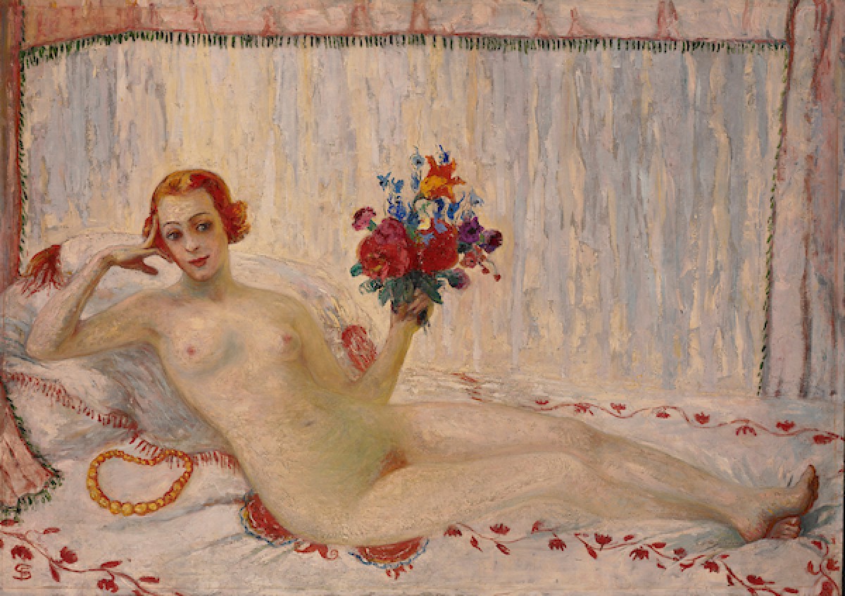 A nude woman posing for a painting