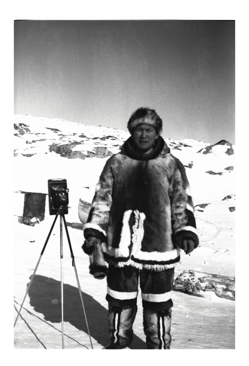 Photo of Peter Pitseolak with his 122 camera