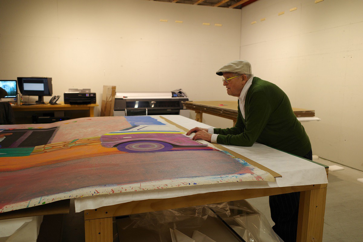 Hockney stretching the canvas, "Santa Monica Boulevard" in the studio