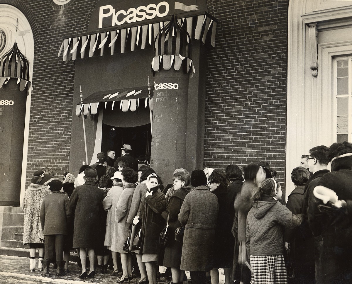 Visitors outside Picasso and Man: The 1964 Exhibition