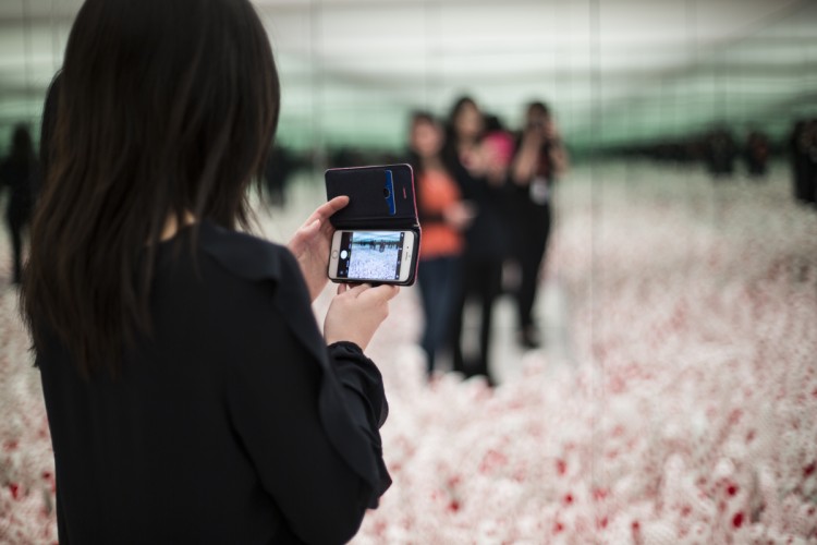 Visitors in Kusama Infinity Mirror Room