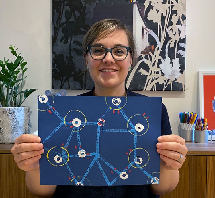 Melissa Pauw displays her print