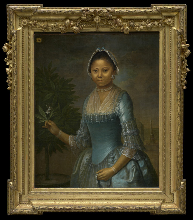  Jeremias Schultz, Portrait of Eleonora Susette, a woman of colour  wearing a rich blue silk gown in the 1770s holding an orange tree blossom in her right hand