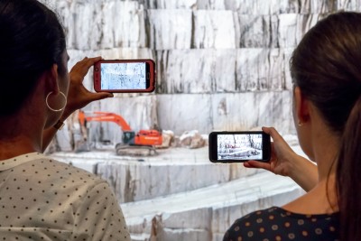 people using an AR app in the exhibition