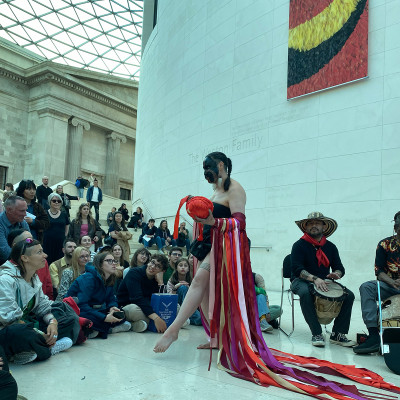 Laakkulauk Willamson performs in the Great Hall of the British Museum