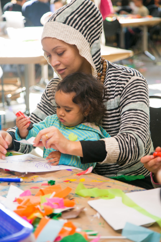 Woman and toddler making art