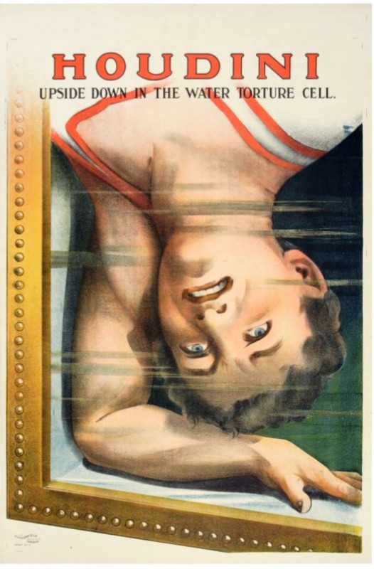 image of a lithograph posted of Houdini upsidedown in a water torture cell looking stressed